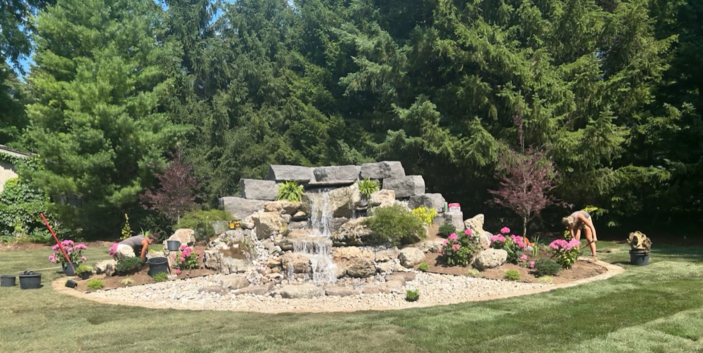 Tropic Ponds custom backyard pond with natural stone edging